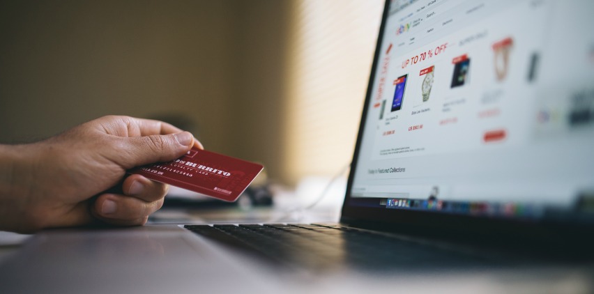 man shopping with credit card