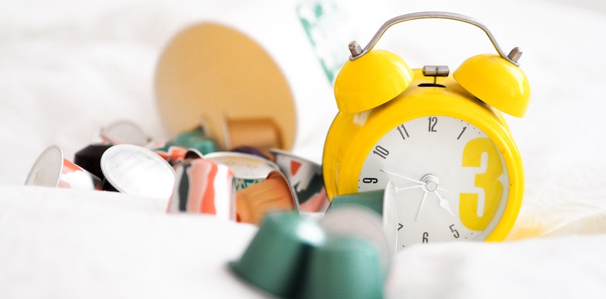 Photo of clocks sitting in a pile