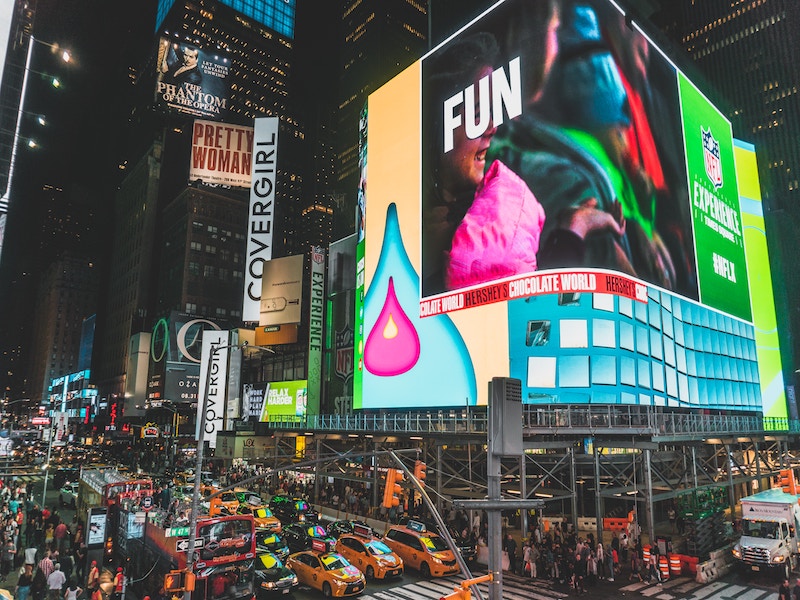 nyc times square at night cars and cabs