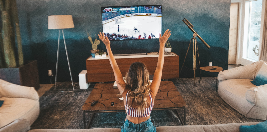 Woman watches TV