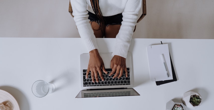 A woman working on a laptop