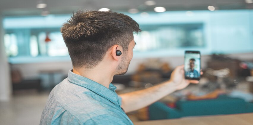 man using talk therapy on phone