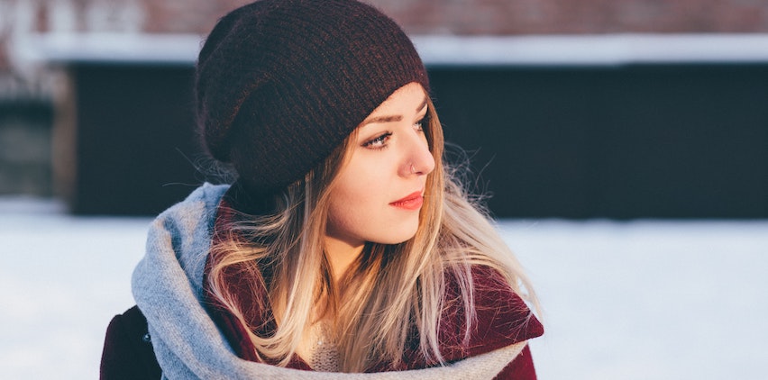 woman with long hair in snow